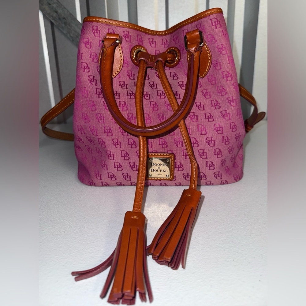 Dooney & Bourke Pink drawstring bucket bag